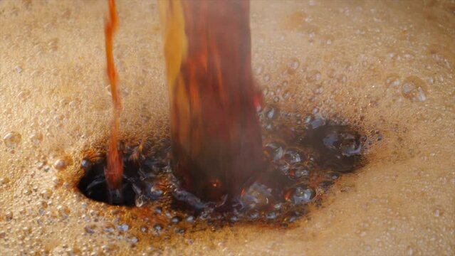 Close Shot of Pouring Freshly Made Molasses in Slow Motion