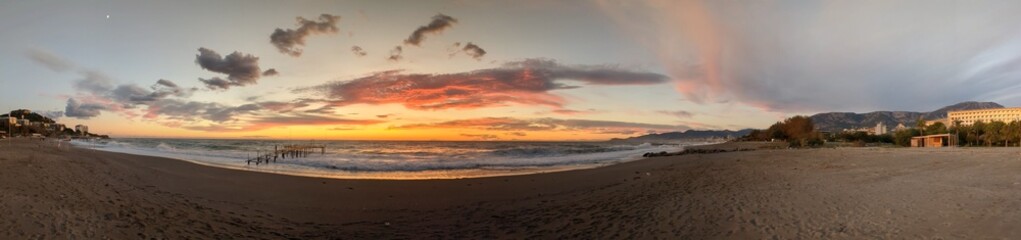 Alanya Antalya region, beautiful sunset at the sandy clear beach of Turkish riviera