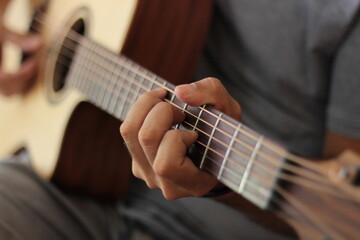 Hands playing chords