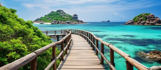 Wooden bridge at beautiful clear water island landscape. AI generated image