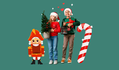 Little children with Christmas tree, presents, drawn nutcracker and candy cane on green background