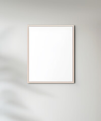 Mockup poster frame close up hang on the wall pastel beige color