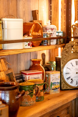 Wooden shelves with various antique items