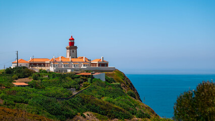 Cabo da Roca, Portugal - 15.08.2023: Lighthouse located above the Atlantic Ocean at the most western point of continental Europe.