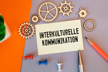 text Interkulturelle Kommunikation, business and learn concept
