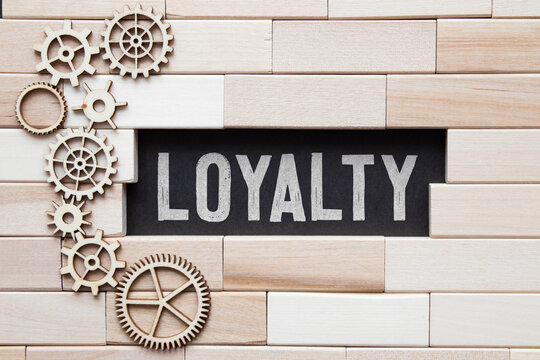 in a paper window the inscription Loyalty. discover loyalty in yourself