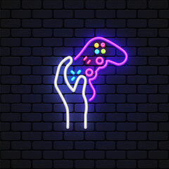 Gamepad hand neon icon in modern style on light background. © Ivan