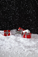 red and silver Christmas gift boxes, New Year banner, snowy decoration, snowfall