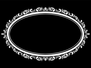 a black and white floral frame on a black background