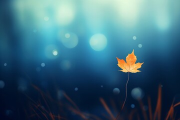 Obraz na płótnie Canvas Vibrant Autumn Magic: Stunning Shot of an Orange Leaf on Blue Grass Generative AI