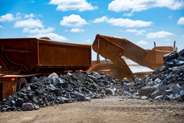 Truck Dumping Ore from Mine