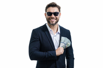 Man in suit holding cash money in dollar banknotes on isolated white background. Studio portrait of businessman with dollar banknotes. Dollar money. Career wealth business. Cash dollar concept.