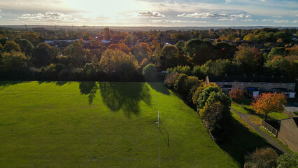 Bird's Eye View of an English Park in Autumn with a Section of a Sports Field