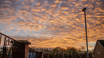 Morning Sky in Shades of Orange with Gently Rippled Clouds
