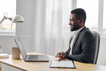 job man person american computer african student office online laptop education freelancer