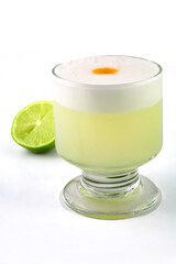 Peruvian food: A glass of the traditional Peruvian national cocktail called Pisco sour.