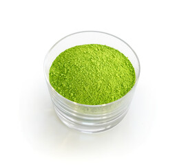 Small glass of premium grade green tea matcha powder
