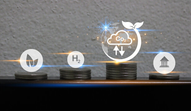 Reduce CO2 emission concept. Clean and friendly environment without carbon dioxide emissions.CO2 reducing icon inside magnifier glass for carbon credit to limit global warming from climate change.