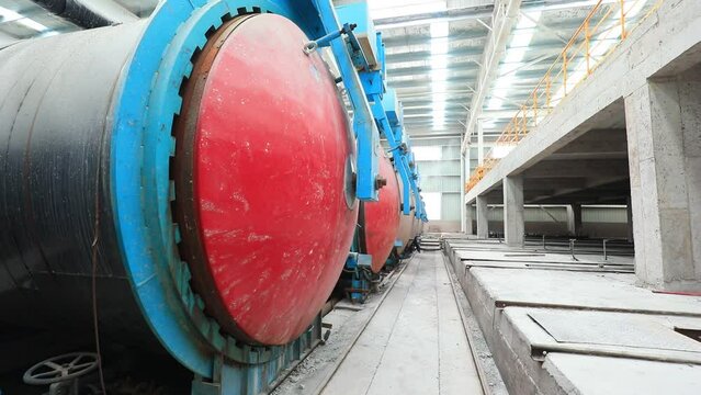 The production line of lightweight partition panels for new building materials is located in a factory
