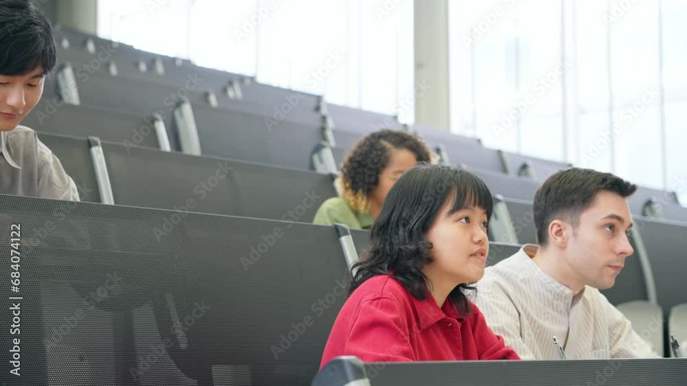 Poster a group of multinational students taking a lecture in an auditorium. international education.