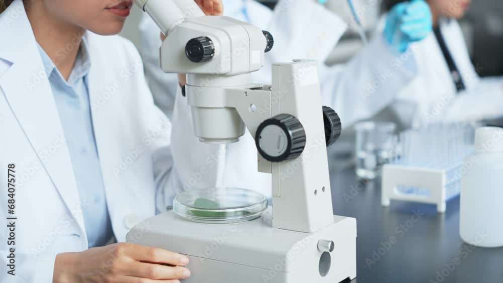 Aufkleber multinational researcher group experimenting in the lab. research and development.