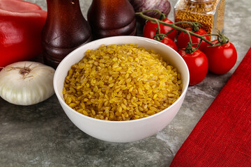 Dry wheat bulgur cereal heap