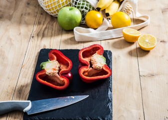 men Cutting Fruit And Vegetables In Kitchen