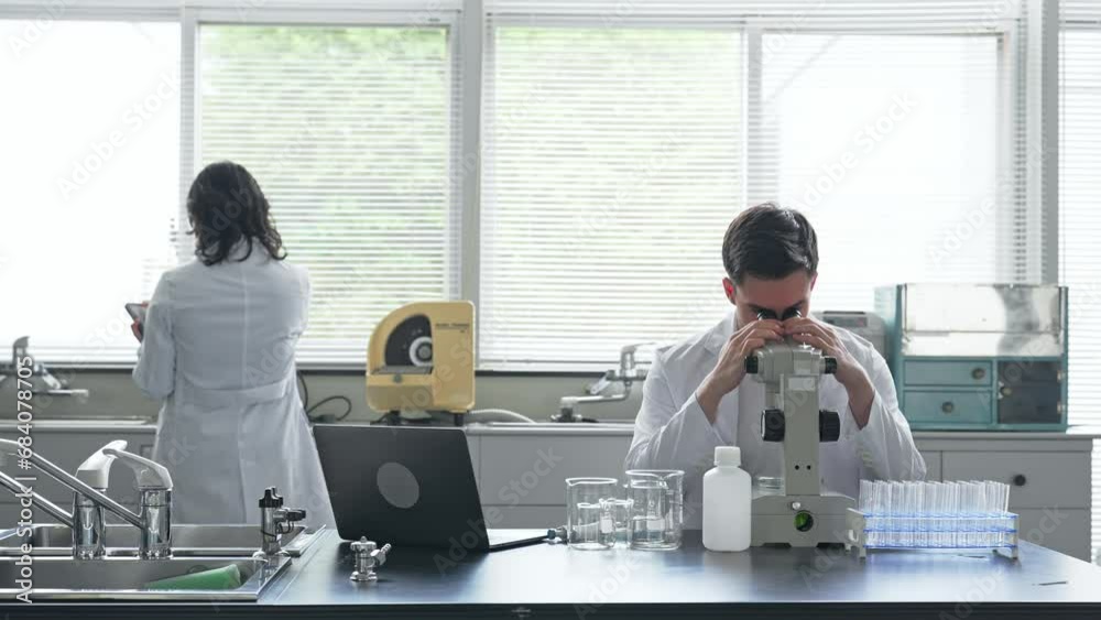 Aufkleber multinational researcher group experimenting in the lab. research and development.