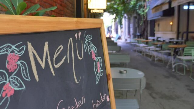 Cafe menu on black board outdoor 