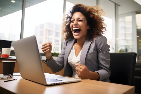 Happy Businesswoman Making Online Purchases with Credit Card on Laptop at Desk in Office Generative AI