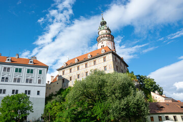 Fototapeta na wymiar Old listed castle with high tower in Cesky Krumlov, Czech Republic.