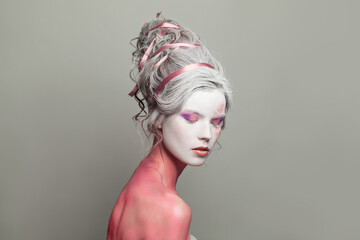 Beautiful creative fashionable carnival model woman blonde, fashion beauty studio portrait - obrazy, fototapety, plakaty
