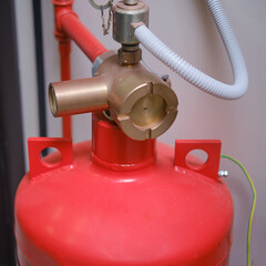 In an emergency, the control valve on the industrial fire extinguisher allows firefighters to...
