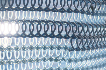 Blue transparent silicone rubber knit net pattern background.