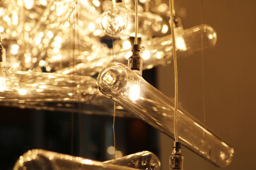 Hanging edison light bulb glass tube background.