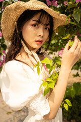 portrait of a girl in a straw hat