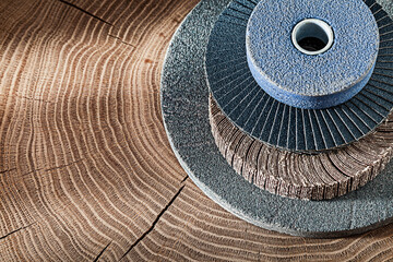 Different Abrasive Wheels Stack On Wood.