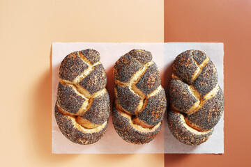 Braided buns with poppy seeds
