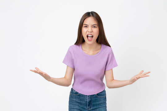 Confused young woman shrugging shoulders, isolated on white background.