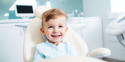 Сute smiling child sits in a modern dentist chair of kids dentistry clinic. Dentist for children, modern dental clinic office. - Powered by Adobe