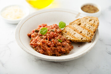 Traditional steak tartare with capers