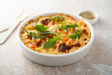 Homemade potato gratin with pumpkin