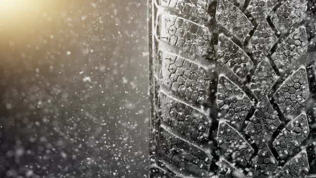 Super Slow Motion of Falling Snow on Tire Sample, Close-up, Free Space for Text. Filmed on High Speed Cinema Camera, 1000 fps.