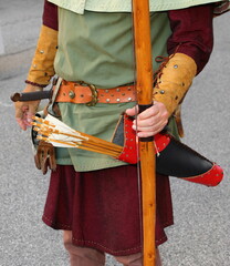 archer with leather arrow holder and  medieval clothes during historical reenactment