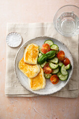 Roasted halloumi cheese with vegetables