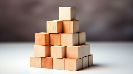 Obraz premium A realistic image of stacked cubes forming a stable tower, reflecting light and casting shadows. The detailed and crisp cubes symbolize teamwork and collaboration, representing balance and stability.