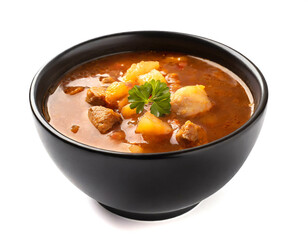 Goulash soup black bowl isolated on white background, cutout
