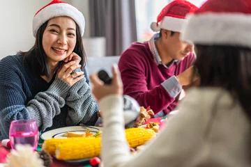 Rolgordijnen Portrait of happy big family celebrating new year eve having fun christmas time and eating food on lunch together enjoying spending time together at home © Art_Photo