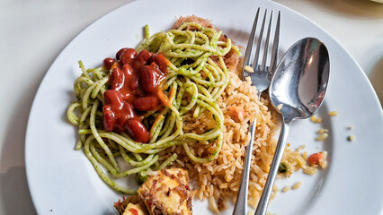 Pesto spaghetti with red beans sauce and curry fried rice