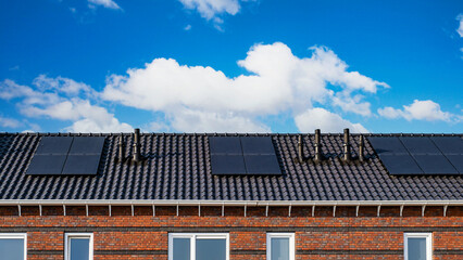Newly built houses with solar panels attached on the roof